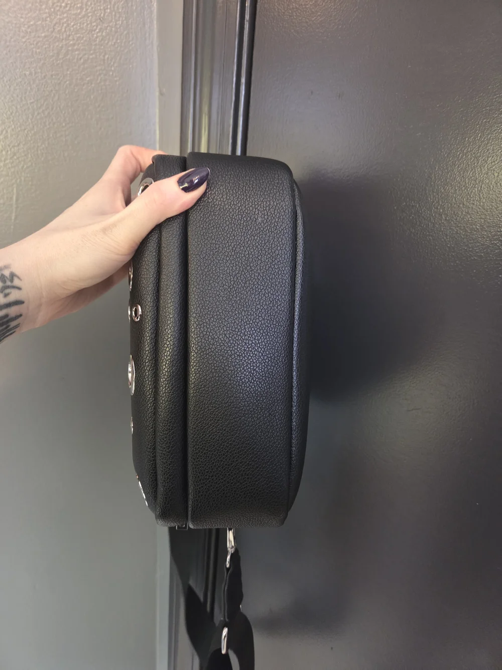 Metal Grommet Handbag